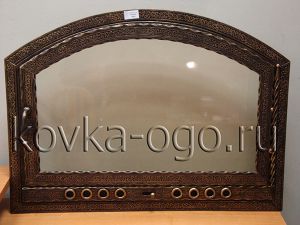 Кованная дверца для камина с огнеупорным стеклом фирмы Robax арочная одностворчатая с поддувалом
